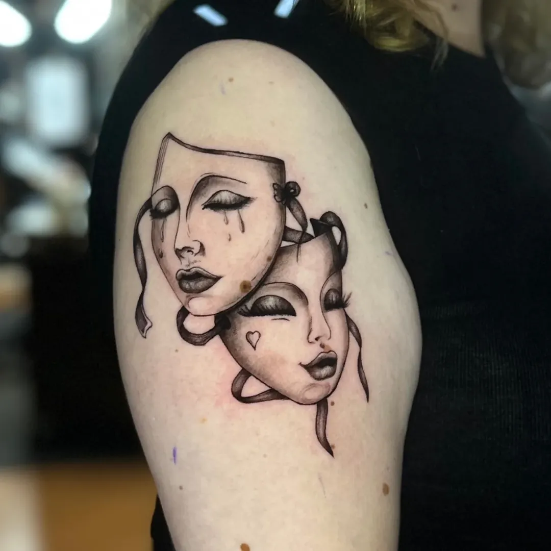 Tatuagem de máscaras de teatro