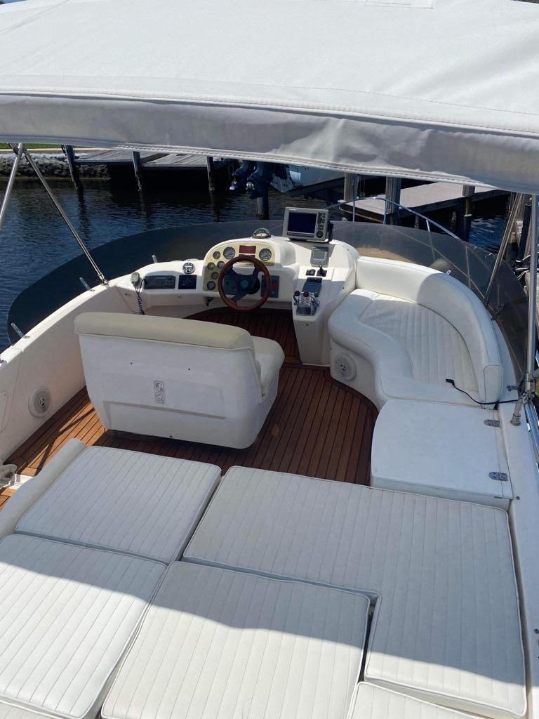 Sealine F37 flybridge helm with sunpads and navigation