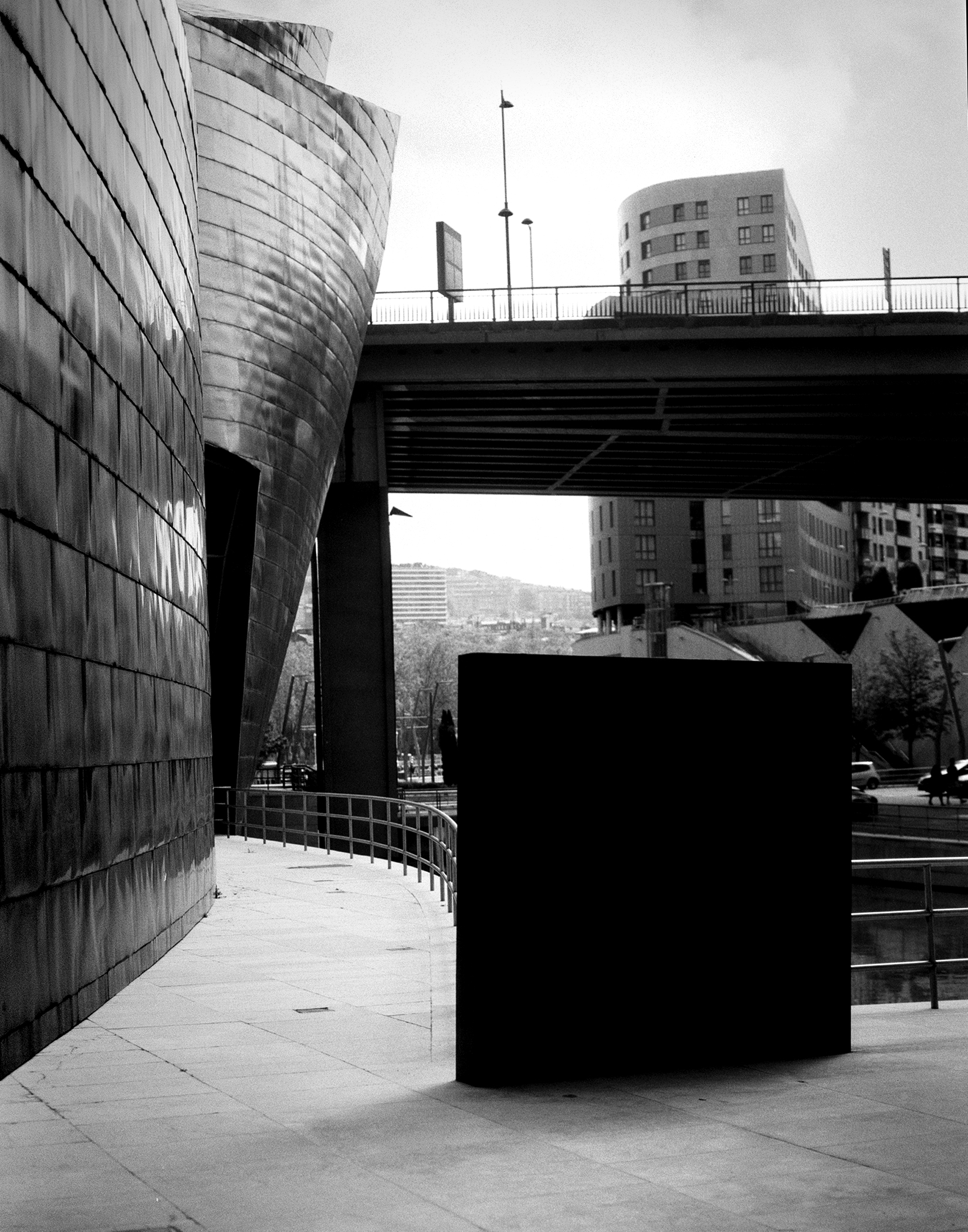 Guggenheim Bilbao dramatic titanium facade with shadows