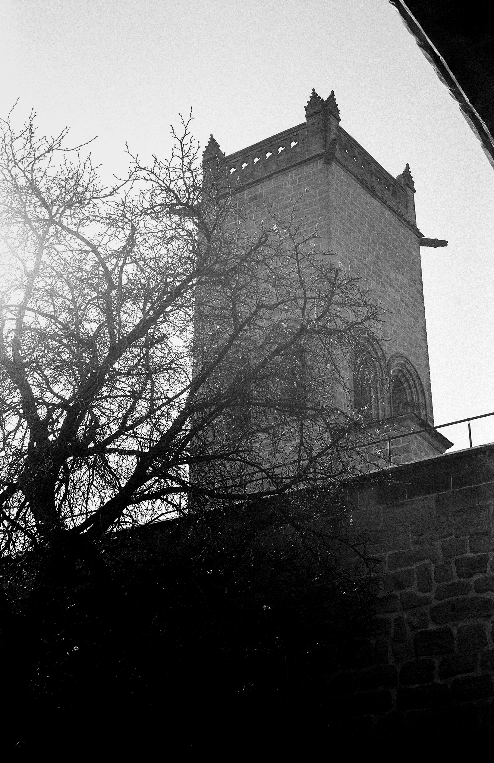 Medieval castle tower with visitors at Olite