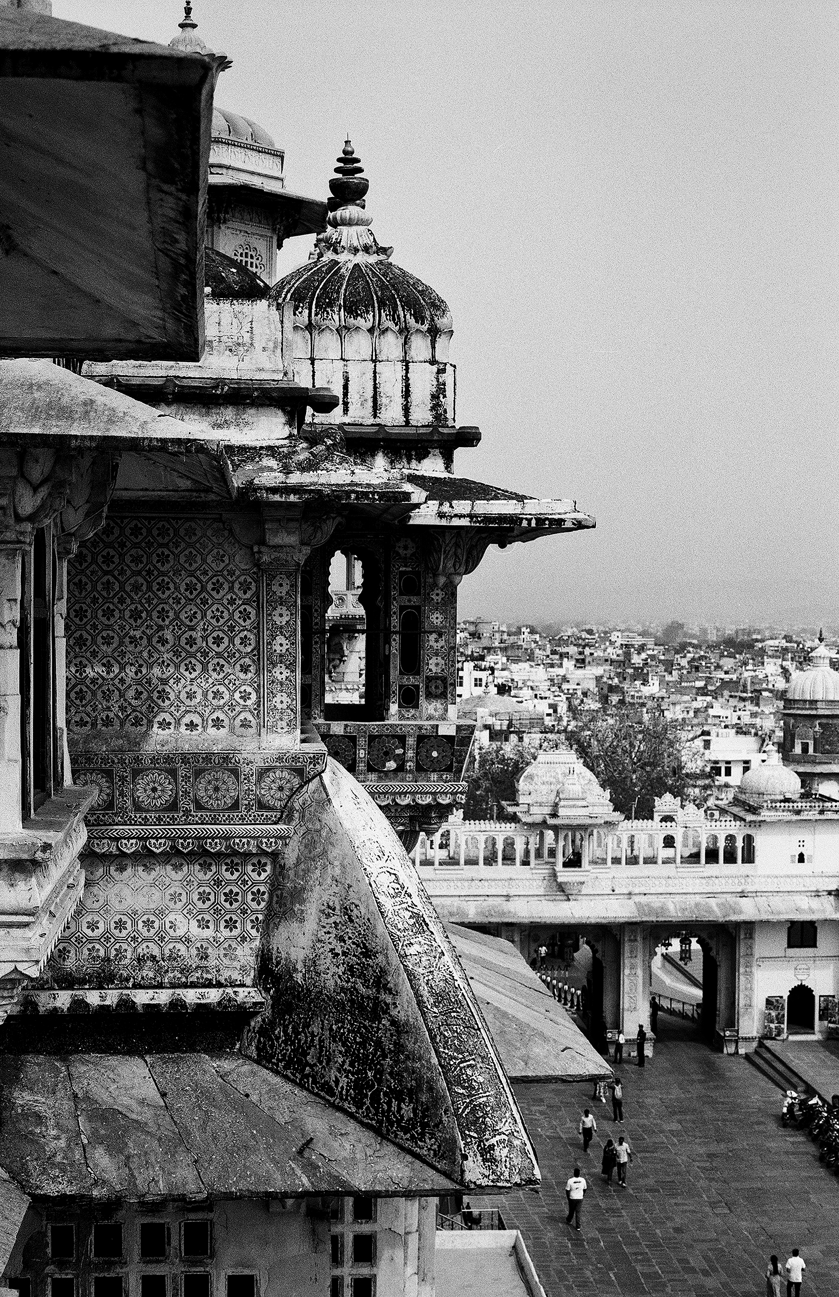 Black and white detailed palace architecture with decorated dome tiled walls overlooking city