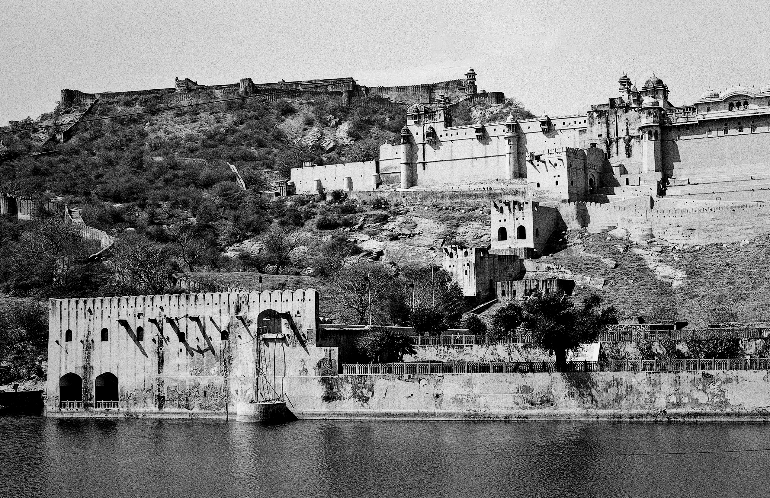 Black and white vast cityscape panorama of Jaipur with dense urban sprawl haze and architectural diversity
