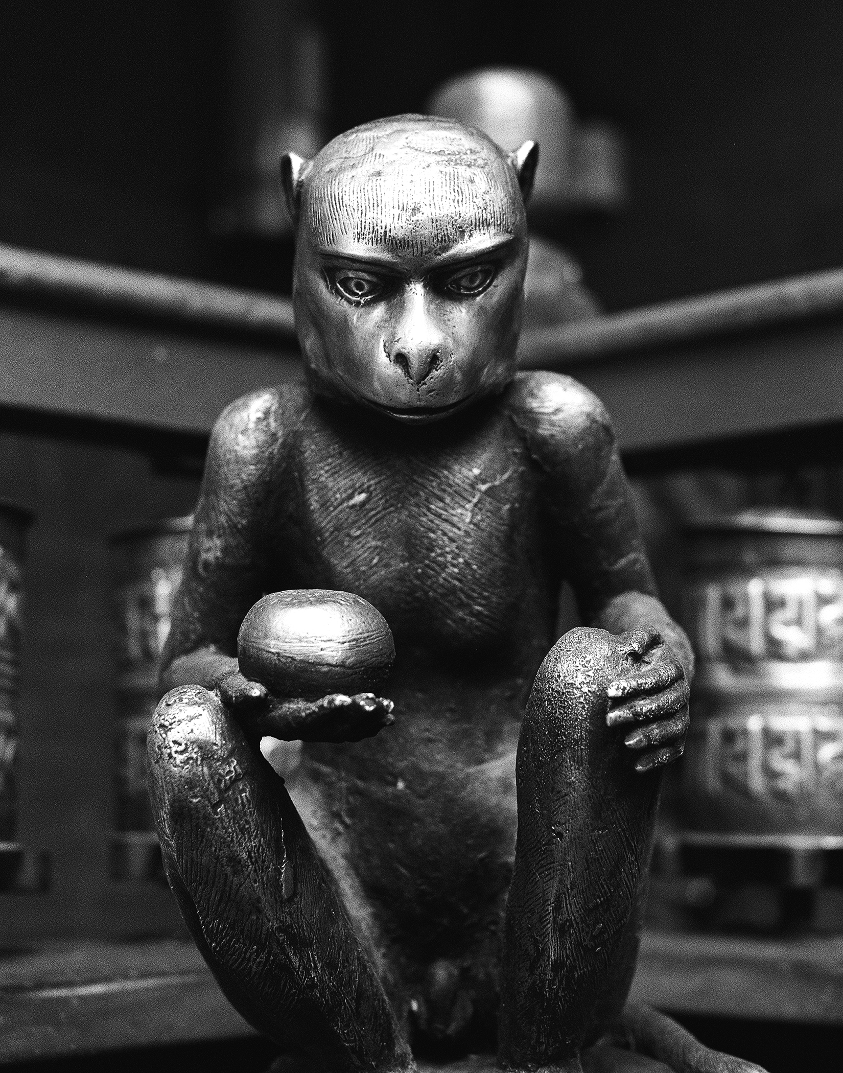 Monkey or primate figurine sculpture with anthropomorphic features