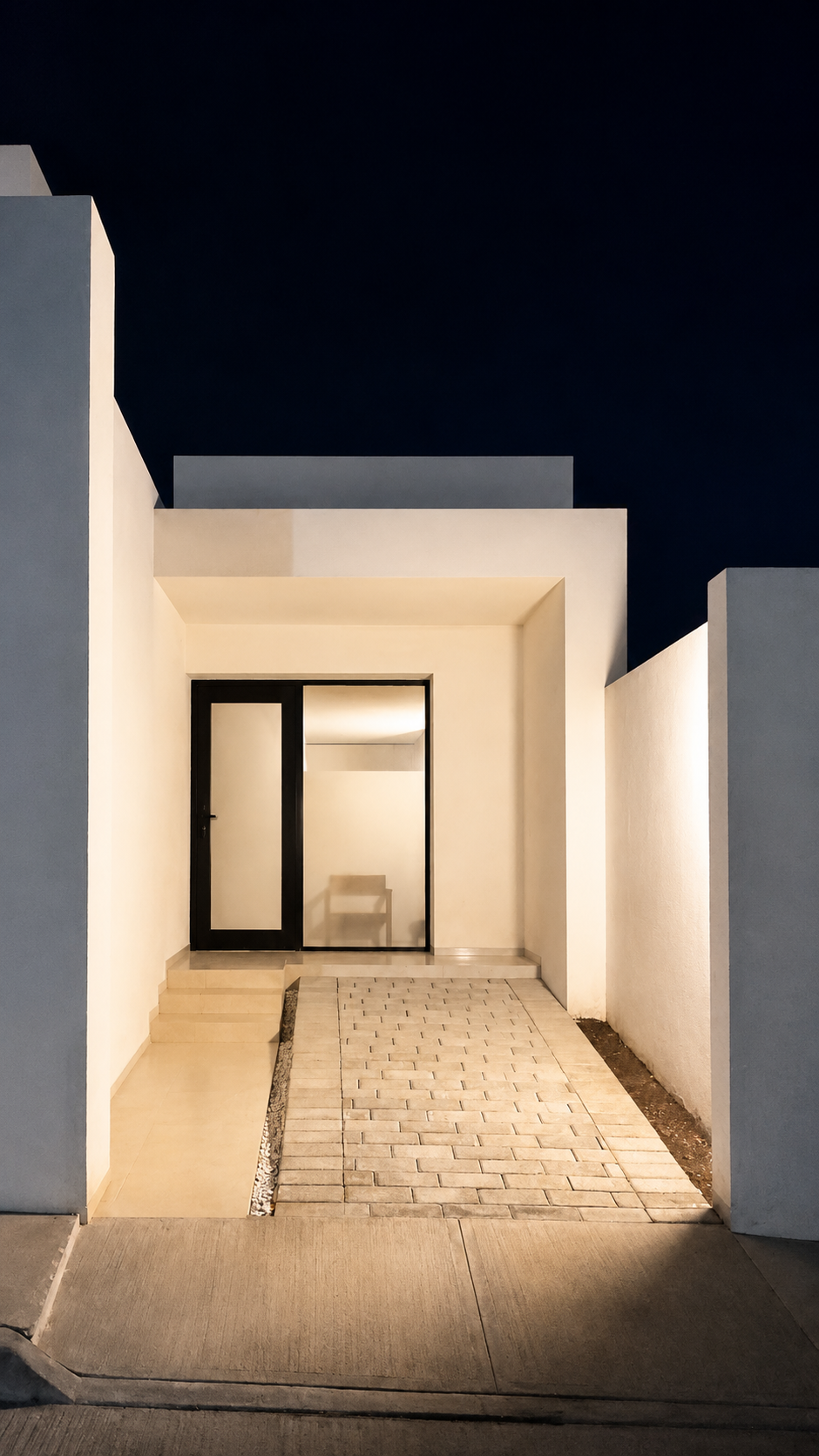 Fachada moderna de noche