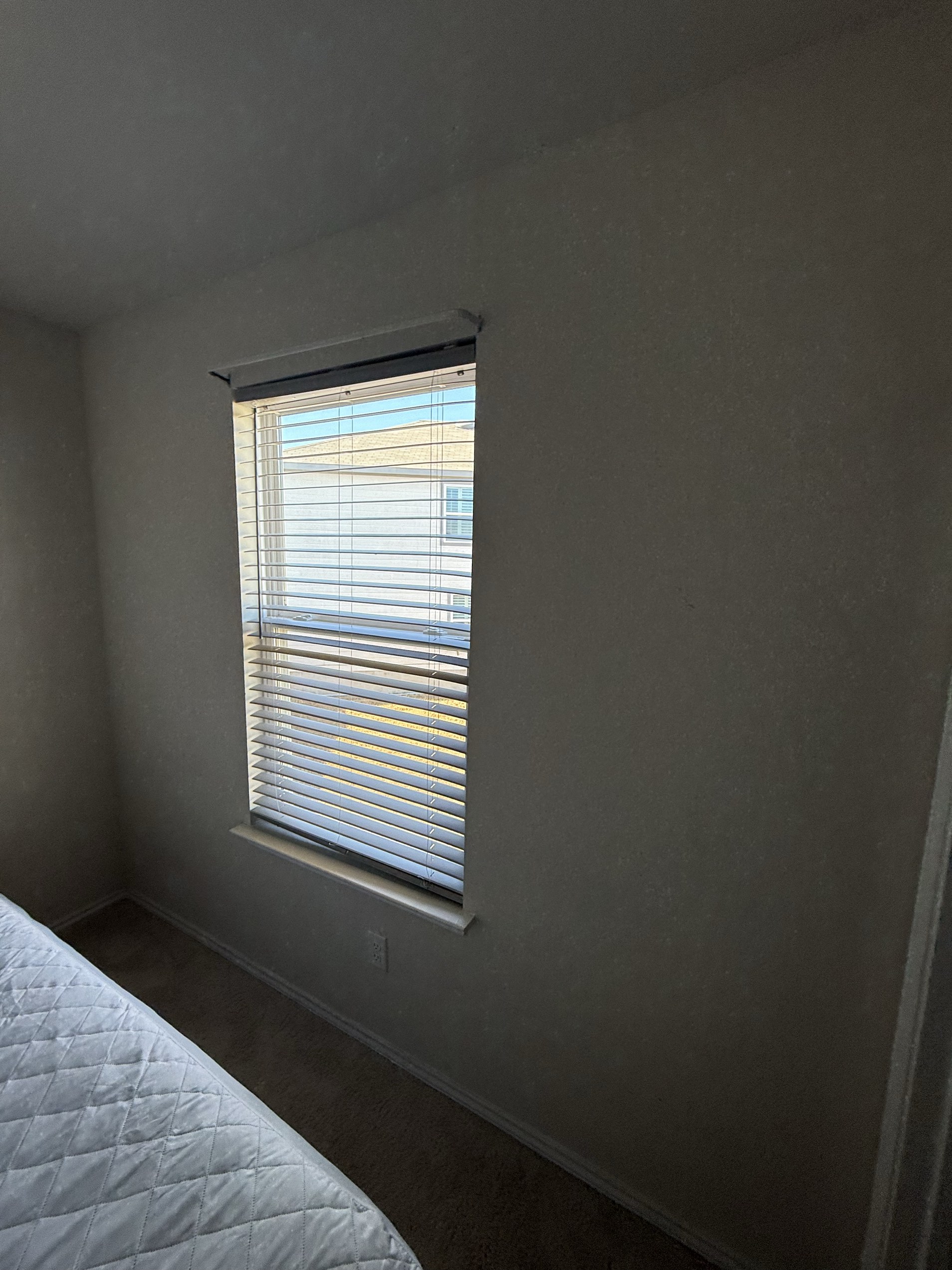 Bedroom window blinds installation