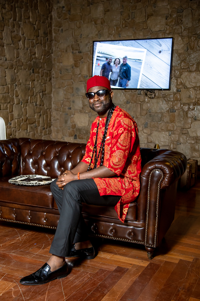 Sam in red cultural attire