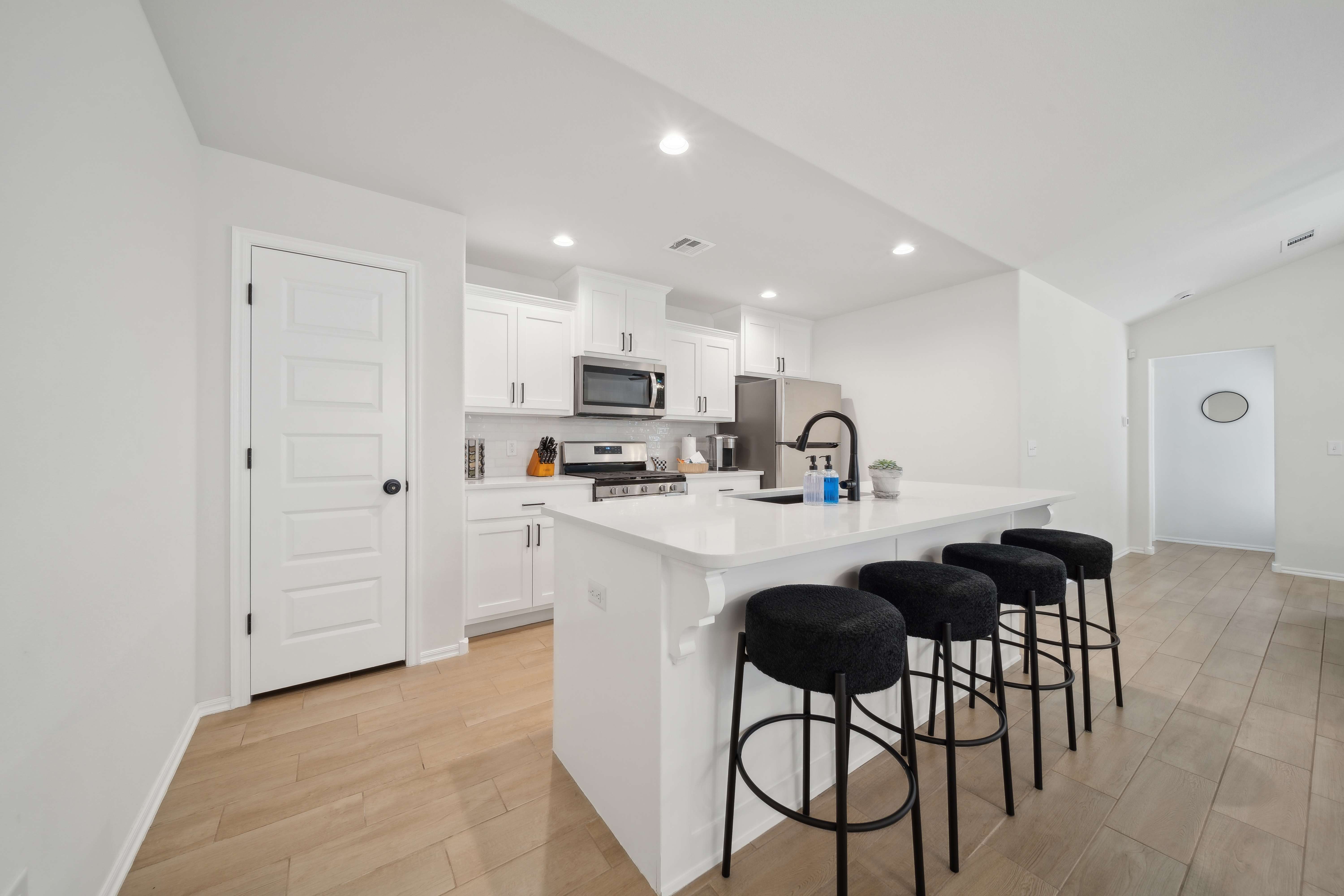 Modern kitchen with island and bar stools