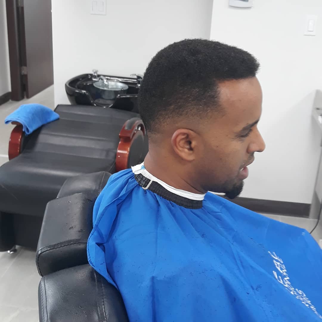 Curly hair grooming with fade