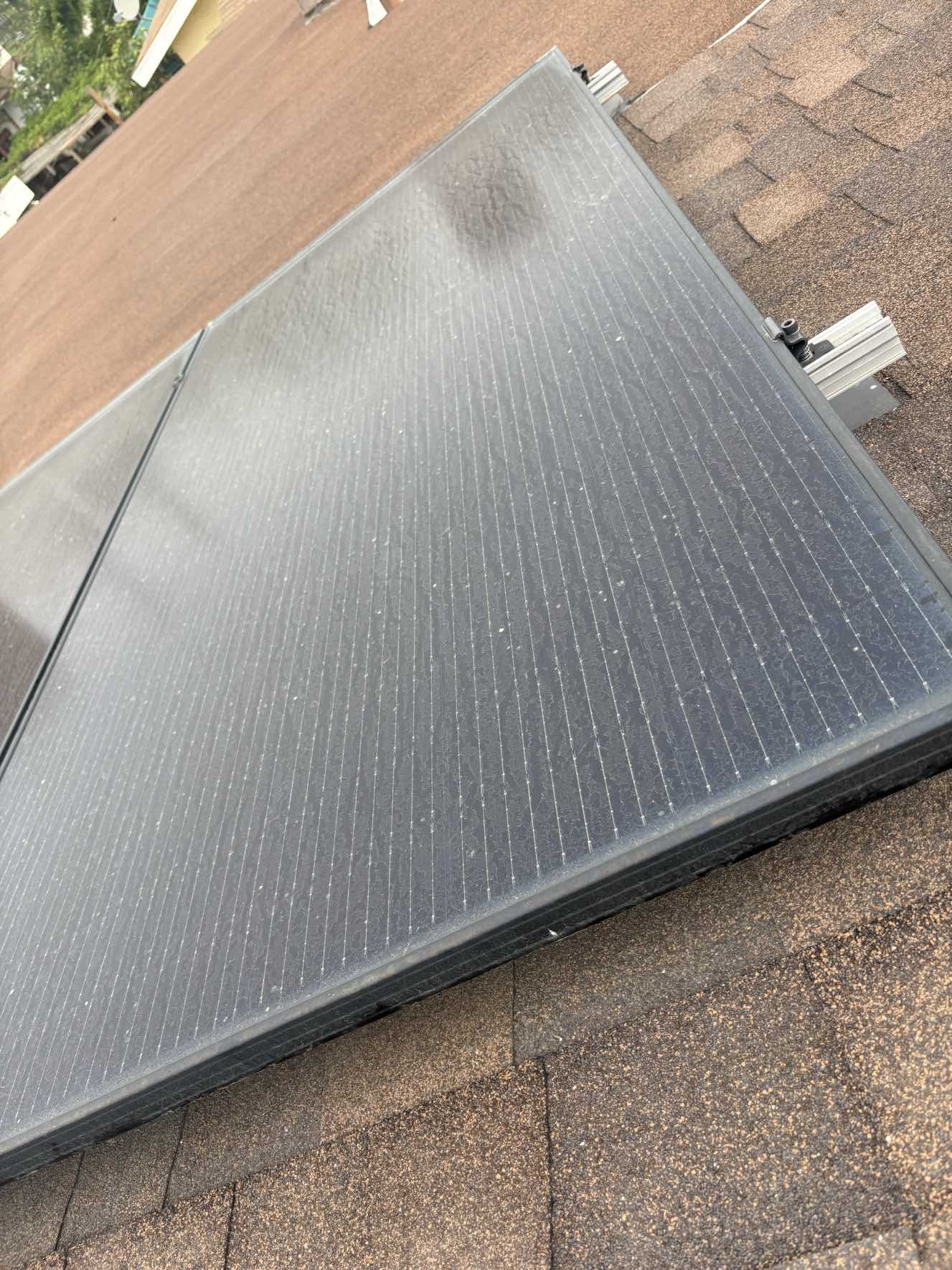 Close-up of dusty solar panel before cleaning