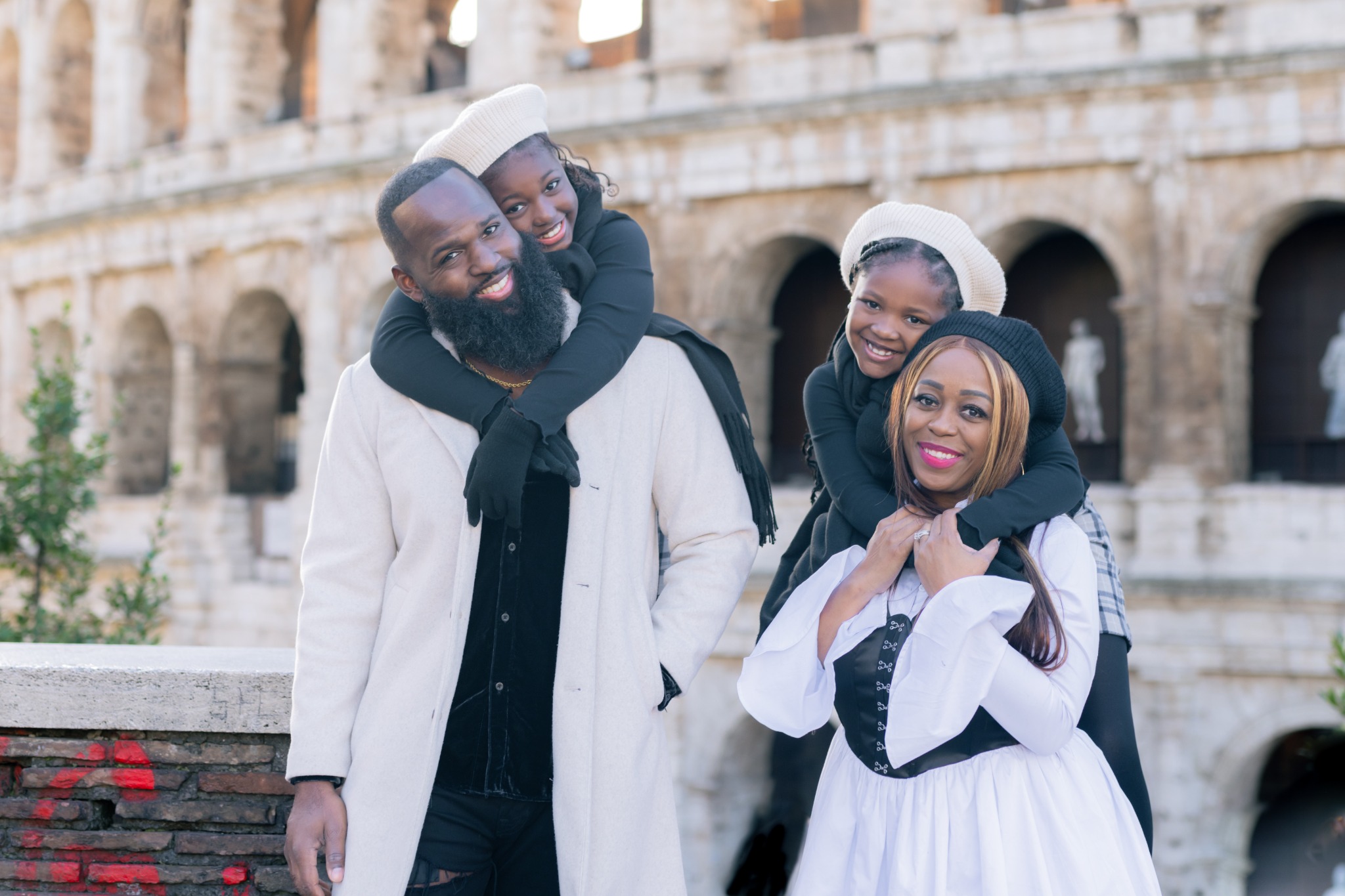Andre Fluellen with his family outdoors