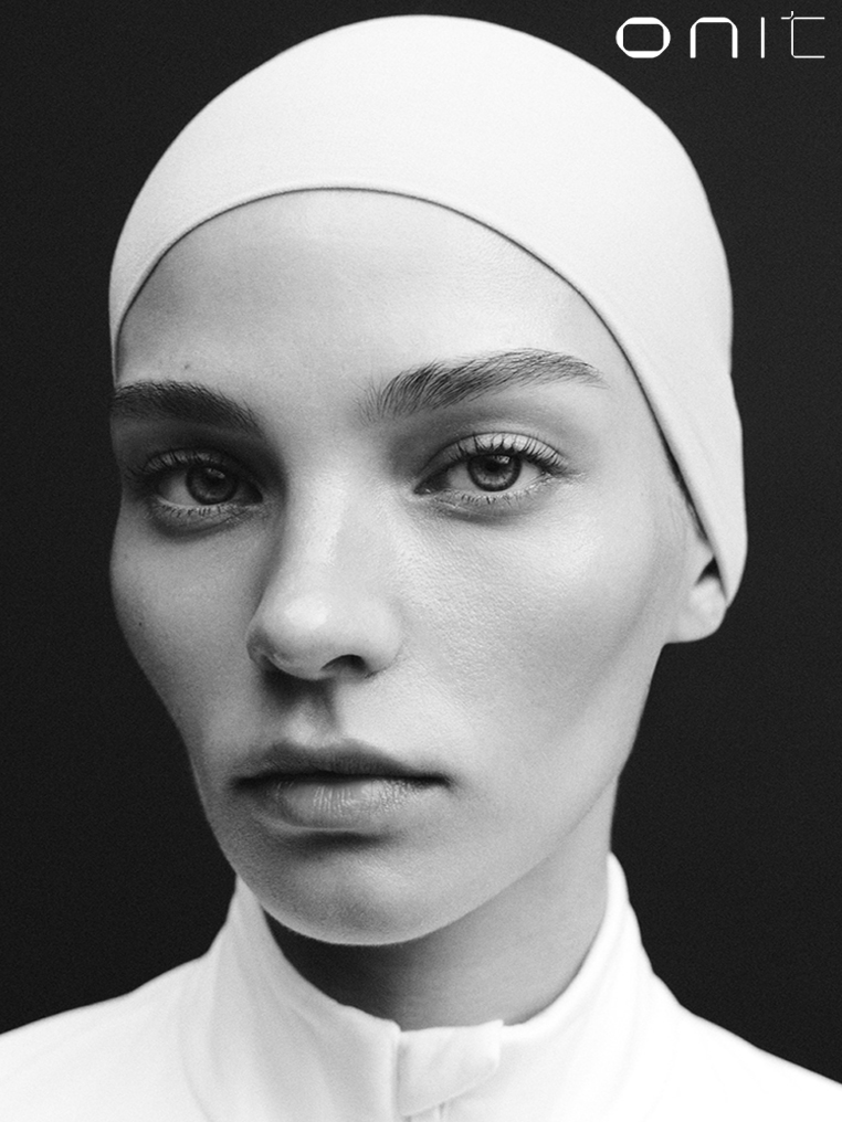 Onit black-and-white beauty portrait with white headwrap