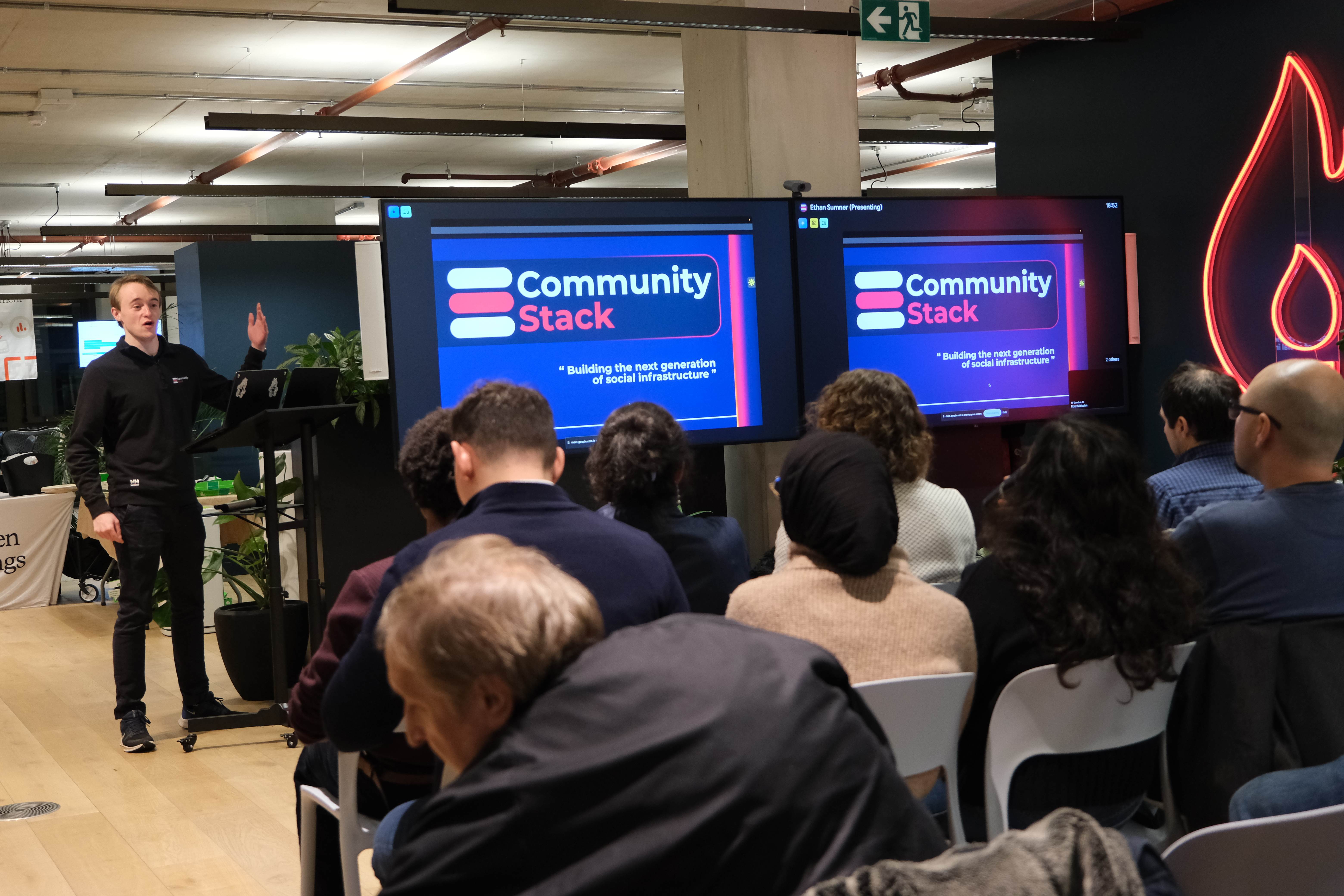 Ethan Sumner presenting CommunityStack at a community event