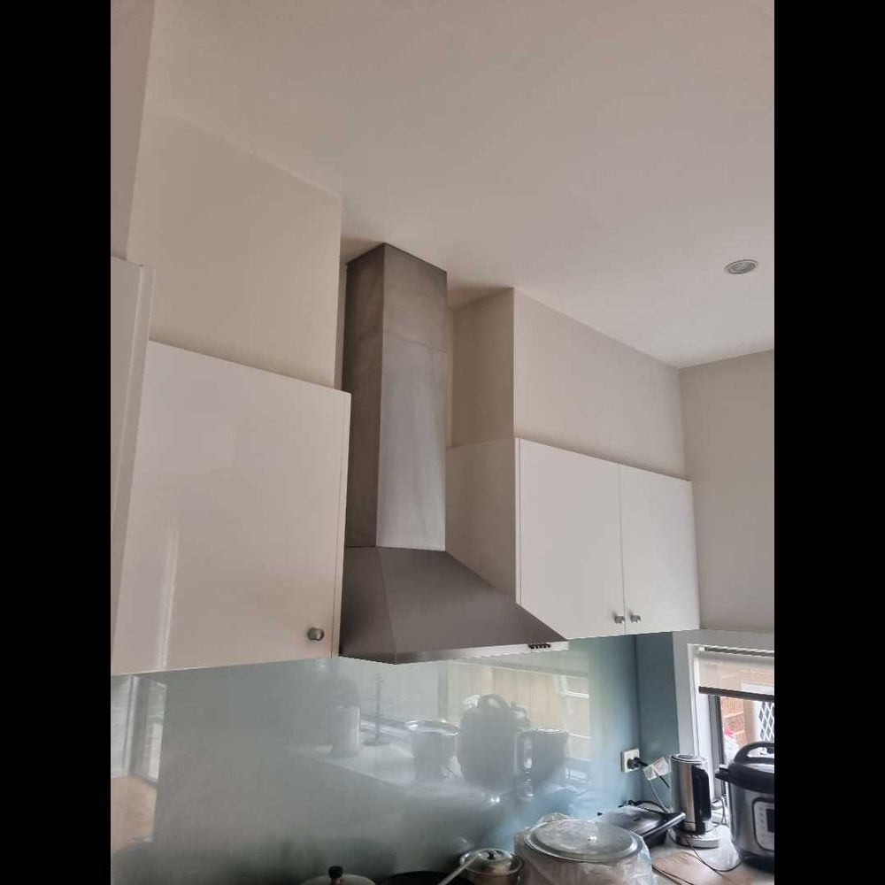 Kitchen rangehood installation with downlights