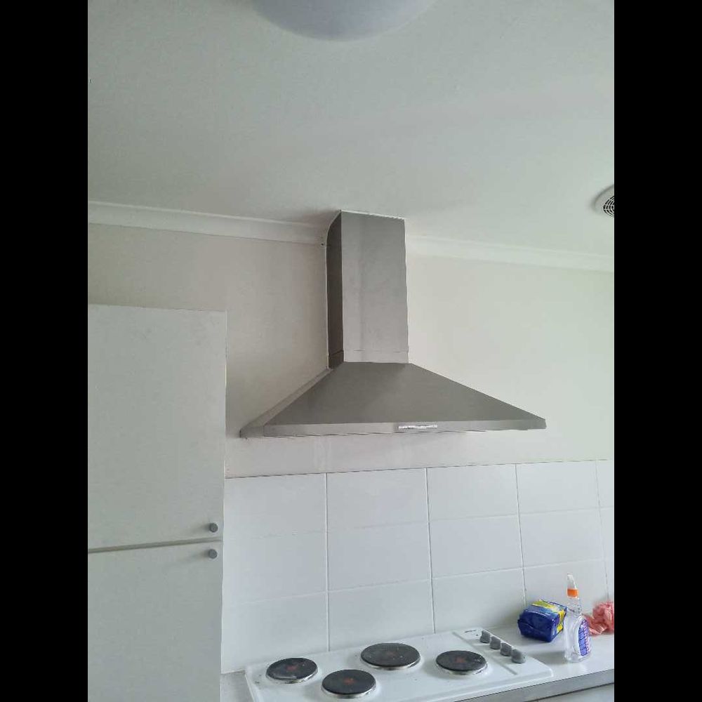 Kitchen rangehood installation above stovetop
