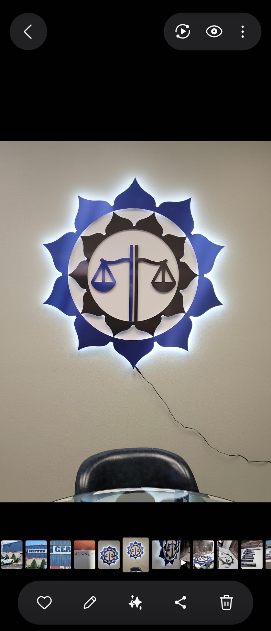 Scales of justice backlit dimensional wall medallion in cobalt blue and dark tones for law office