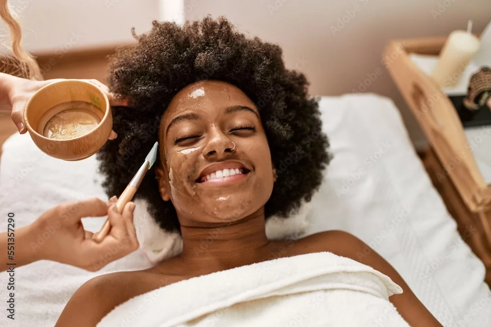 Woman receiving facial