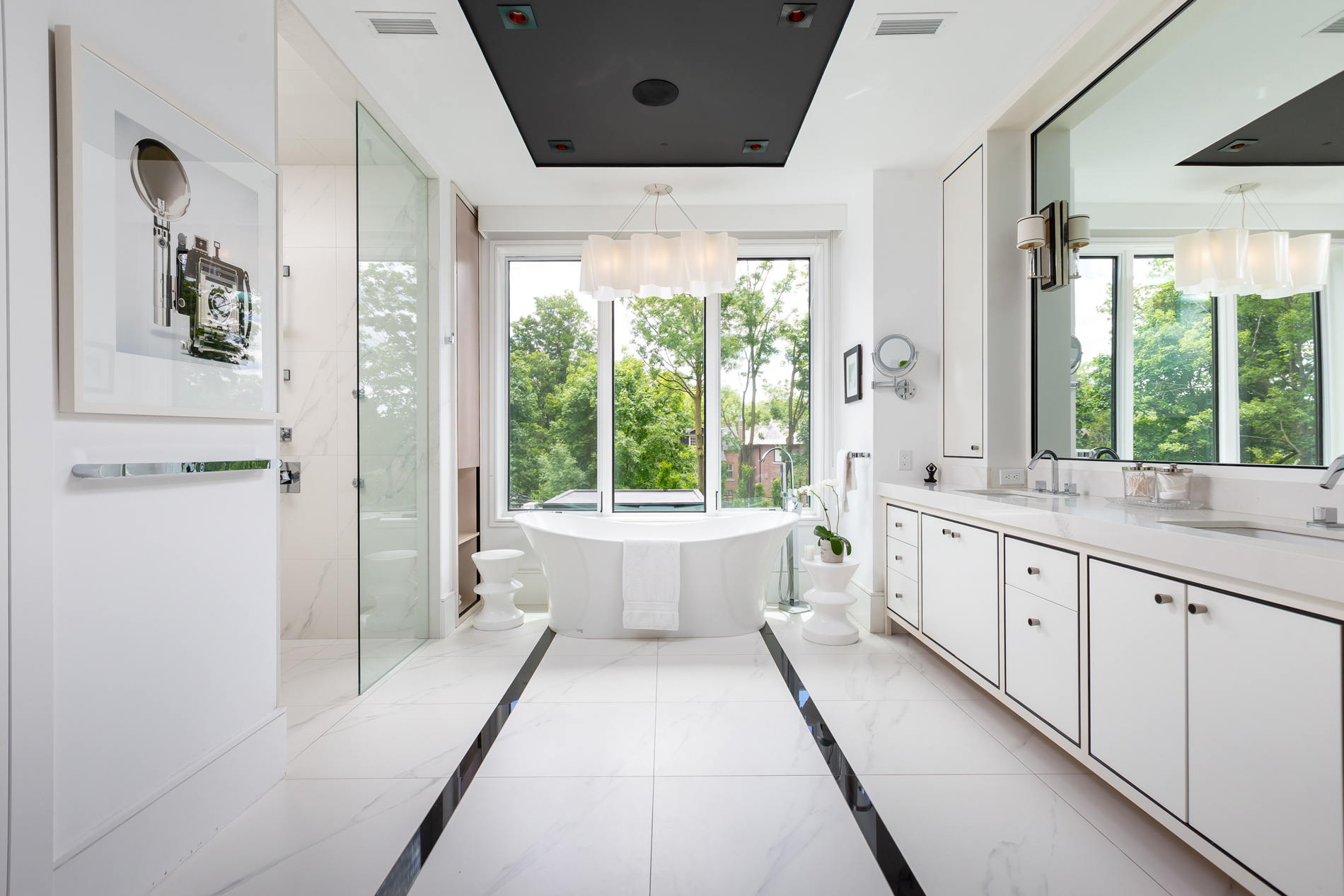 Luxurious white bathroom with freestanding tub