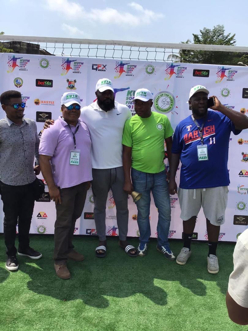 KUTH Foundation organizers and VIPs at the media backdrop