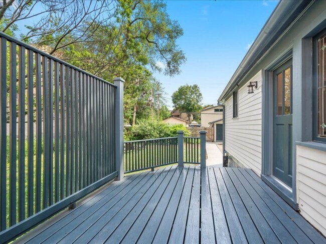 Freshly painted deck with railings