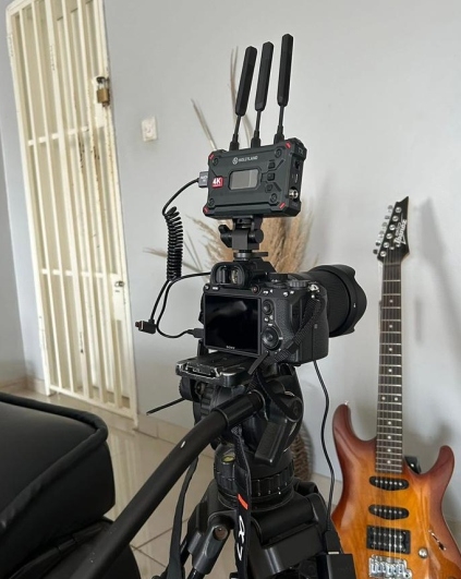 Professional wireless camera systems and broadcast equipment on tripod