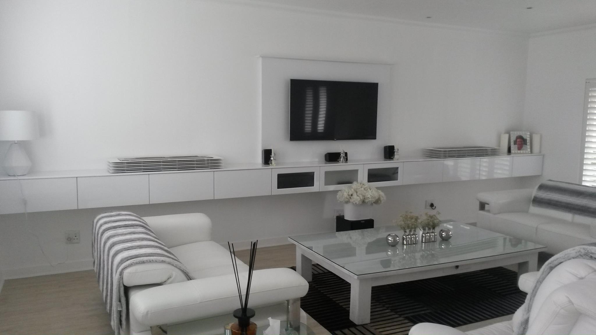 White Minimalist Full-Wall TV Unit