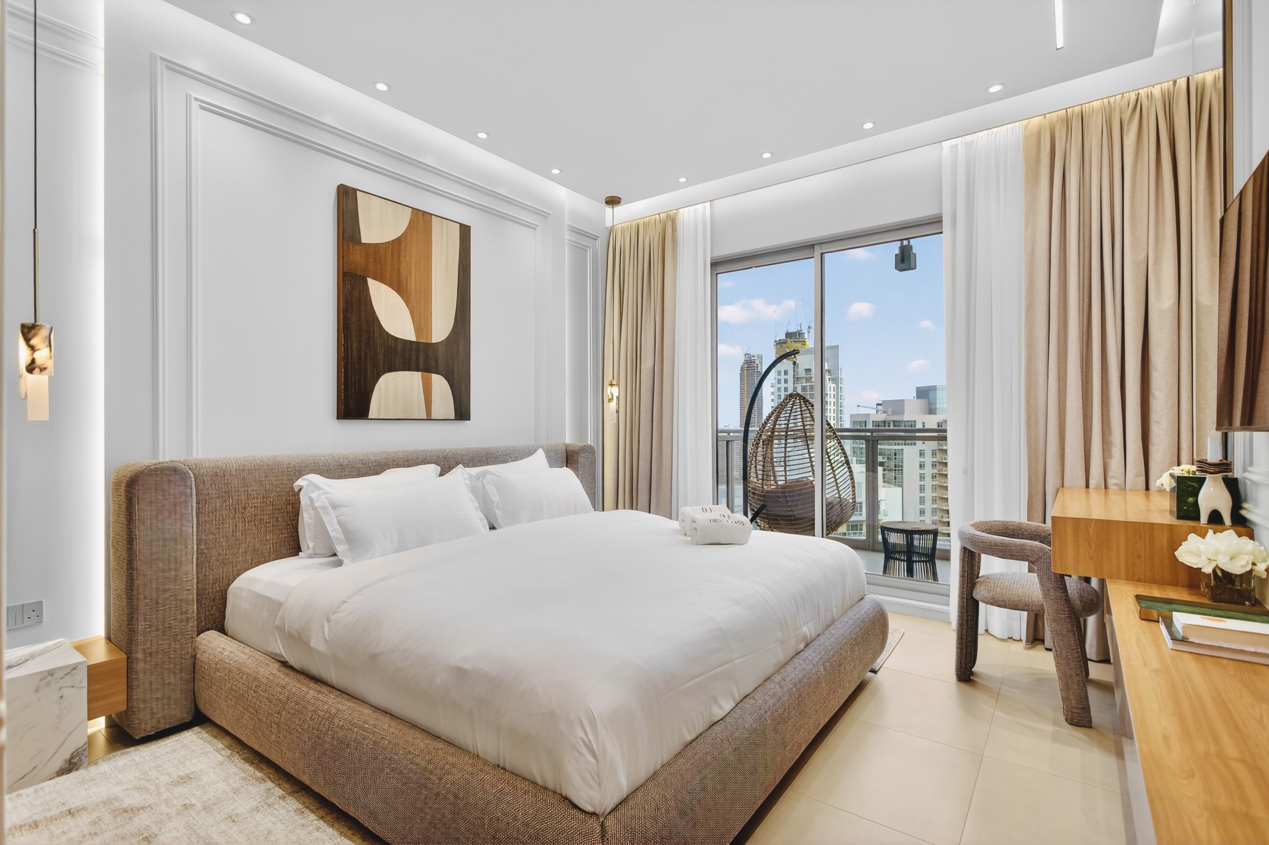 Luxury bedroom with city view and balcony