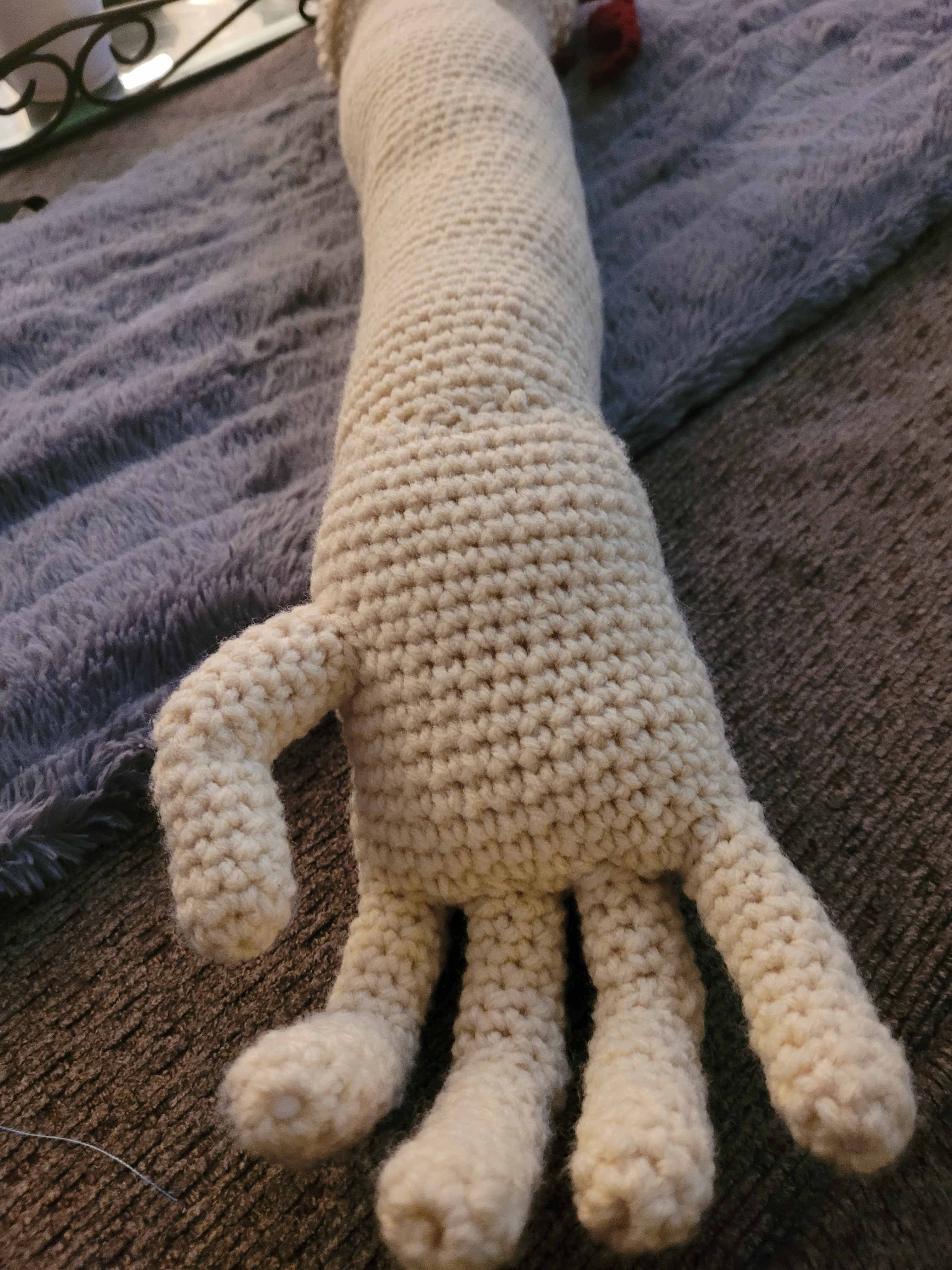 Close-up of the crocheted soft arm and hand