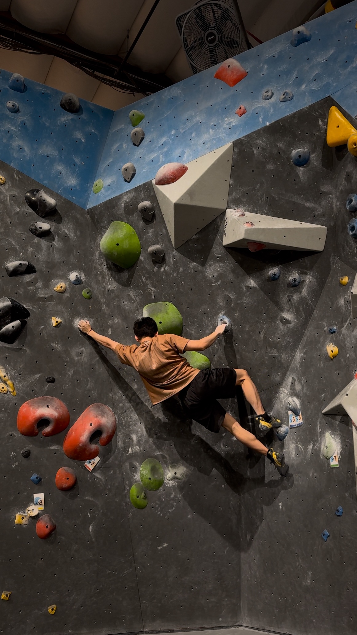 Rock climbing at an indoor climbing gym