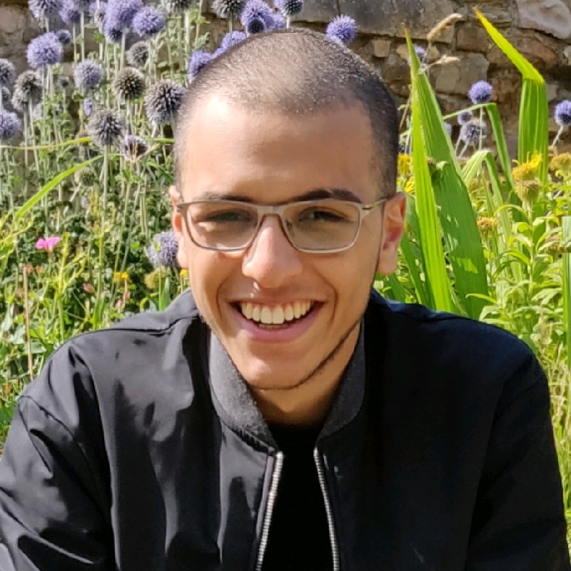 Mohammed Habeb, founder of Bixitly — smiling, wearing glasses, photographed outdoors