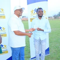 Award ceremony with two men shaking hands