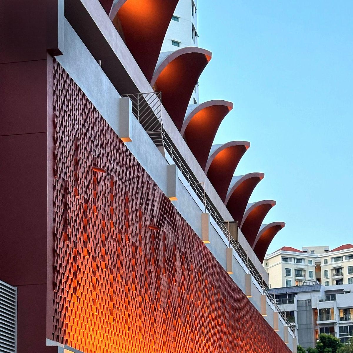 Red scalloped facade architectural detail