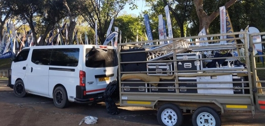 Equipment transport vehicle with staging and rigging equipment