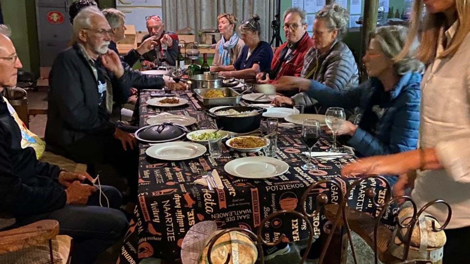Community dinner gathering with artists