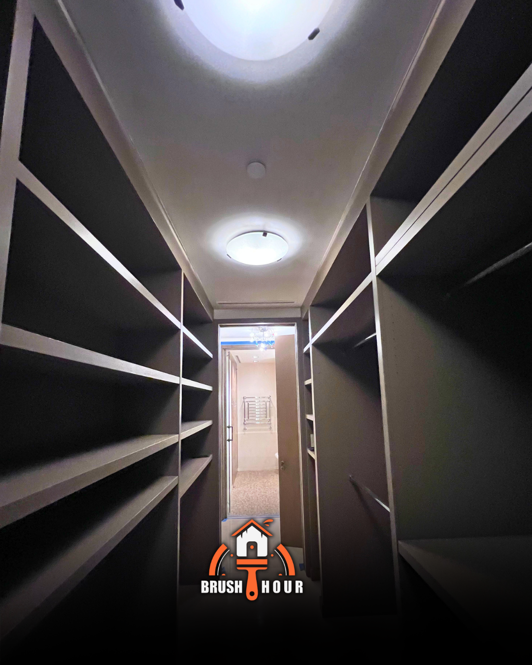 Dark walk-in closet with shelving