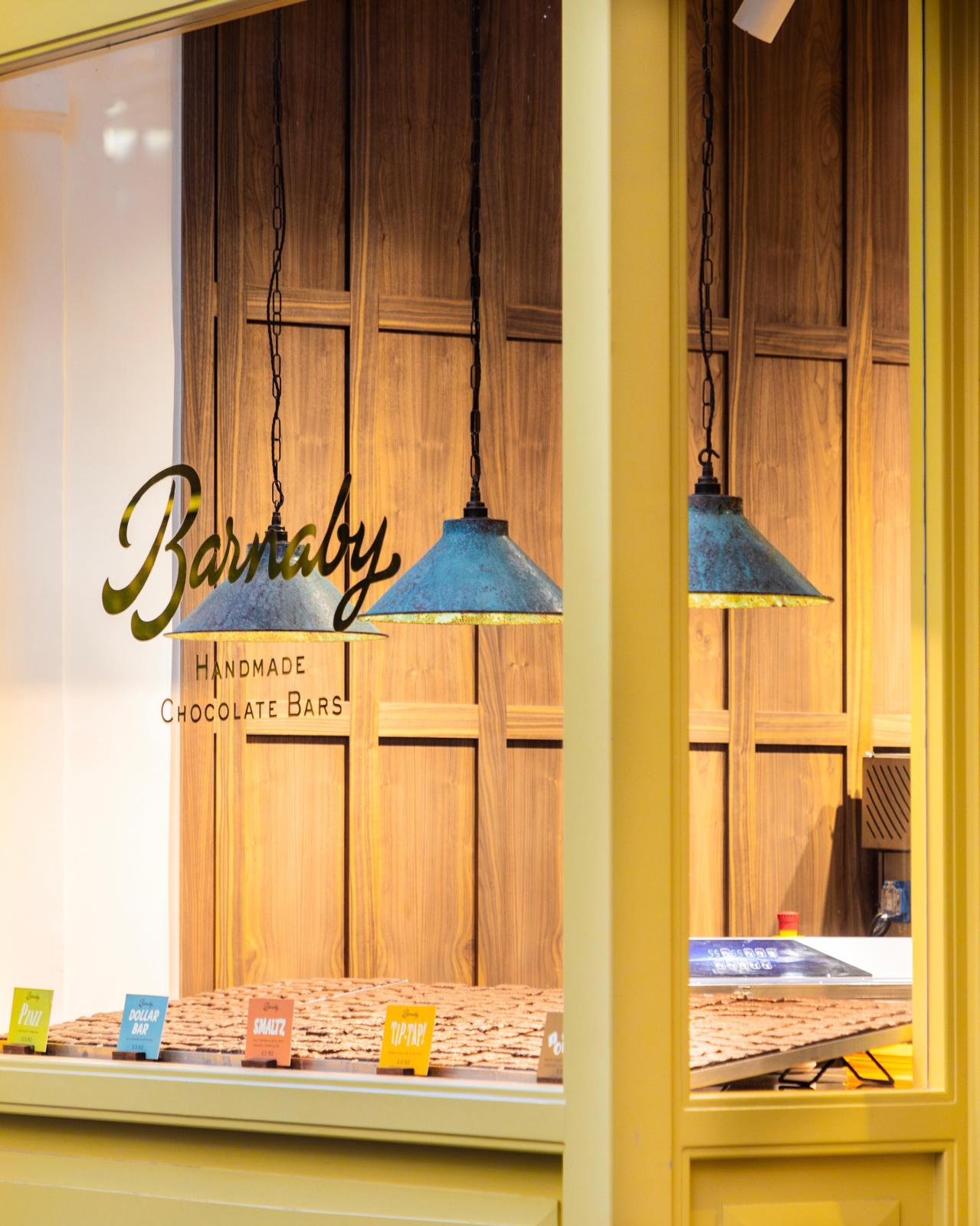 Commercial storefront with professional branding and lighting