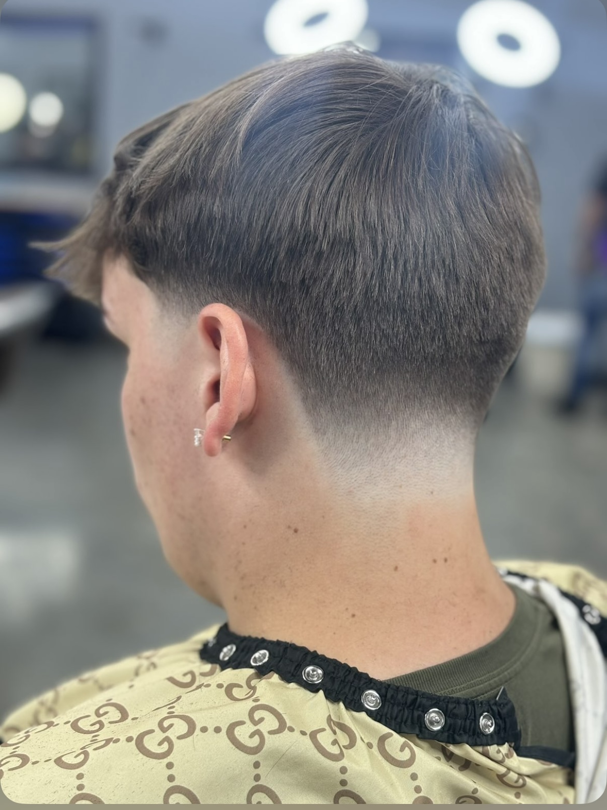 Low fade with longer top