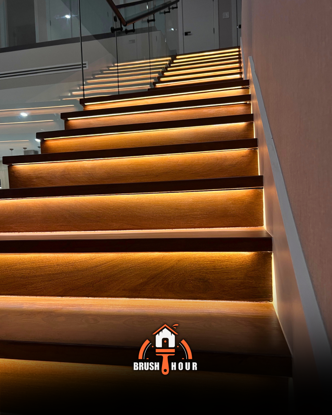 Illuminated staircase with wood and lighting