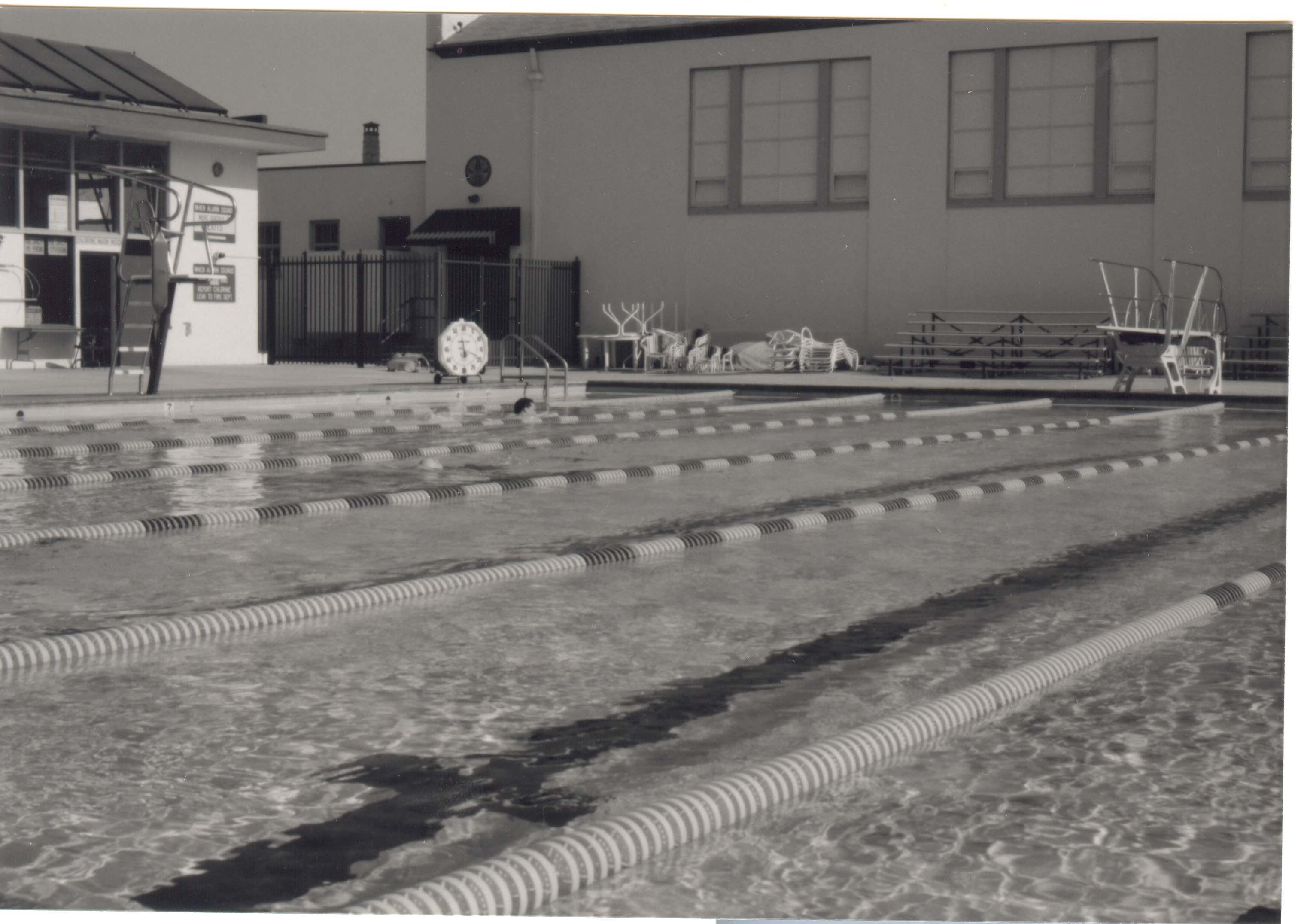 Campbell pool lanes and diving board viewed from the end of the pool.