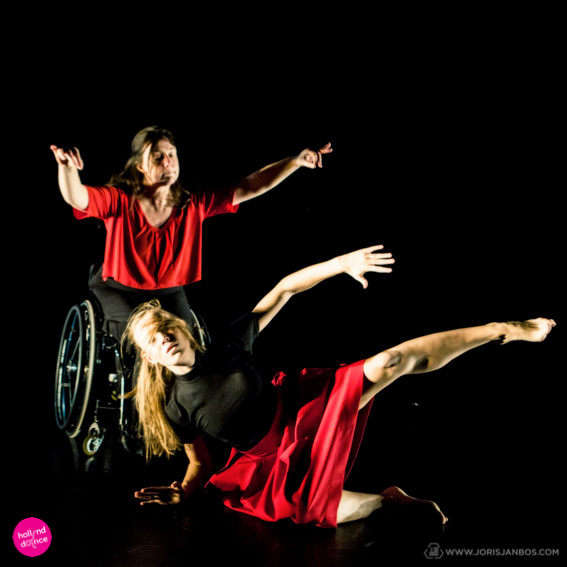 Dance Able duet, dancer in wheelchair and standing dancer in motion