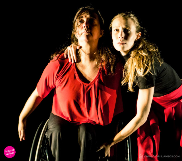 Dance Able duet, dancer in wheelchair and standing dancer in close embrace