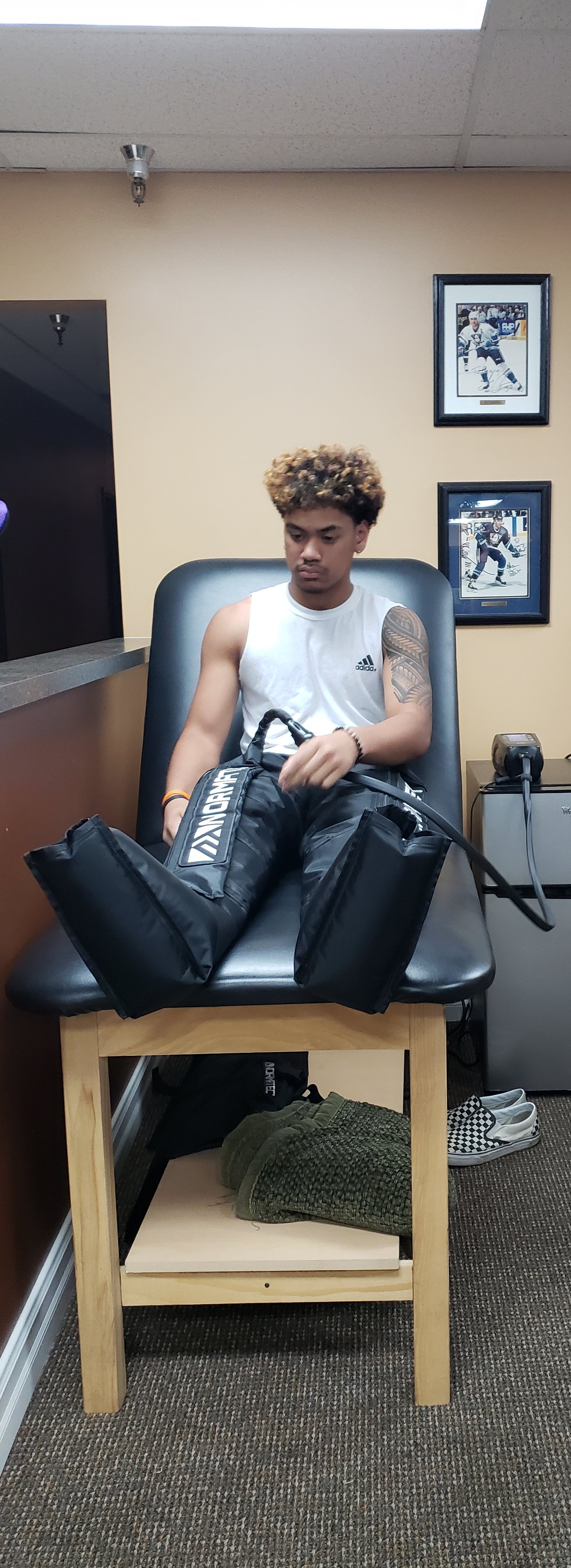 Athlete receiving chiropractic adjustment