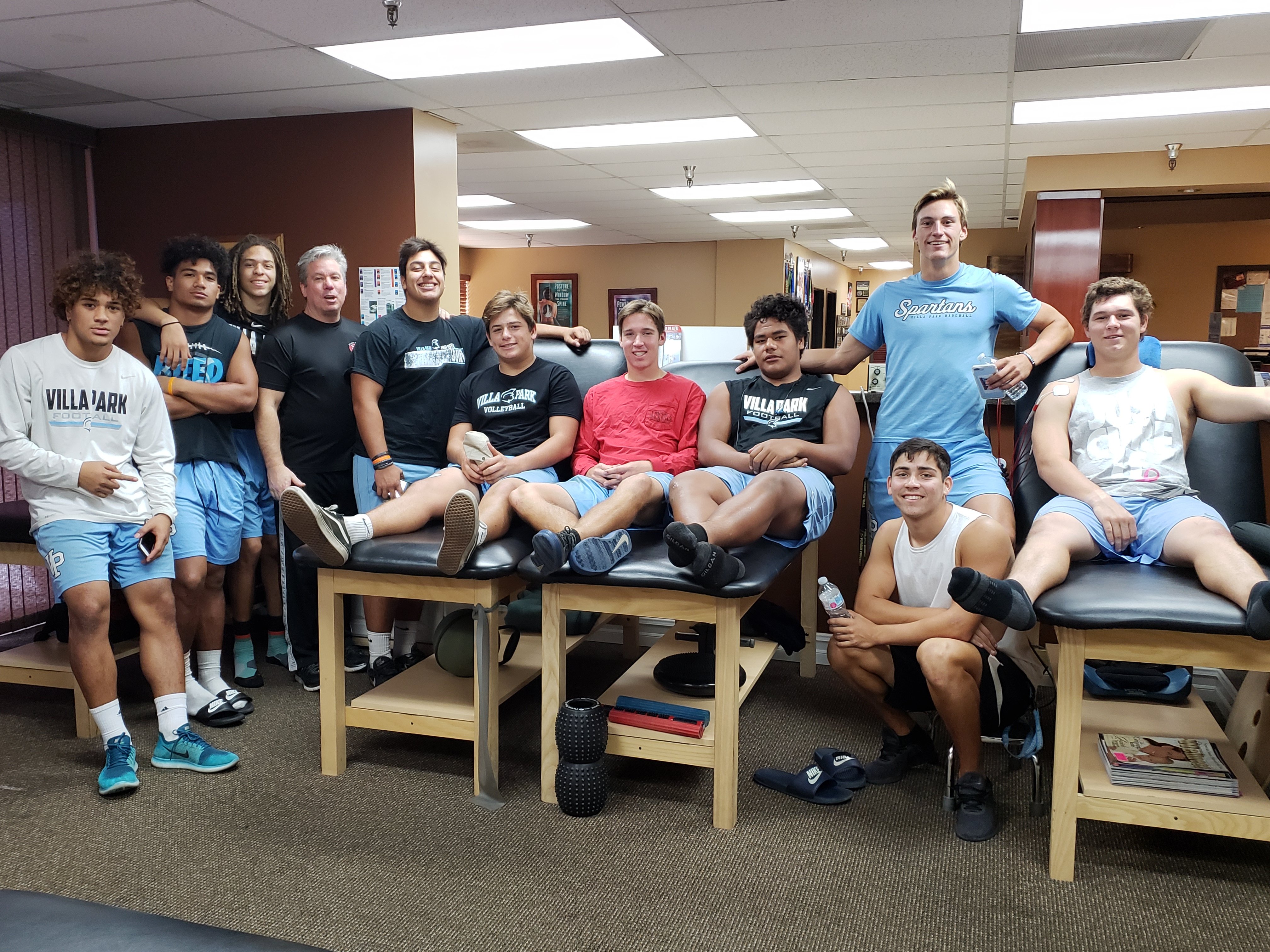 Large group of student athletes and team members