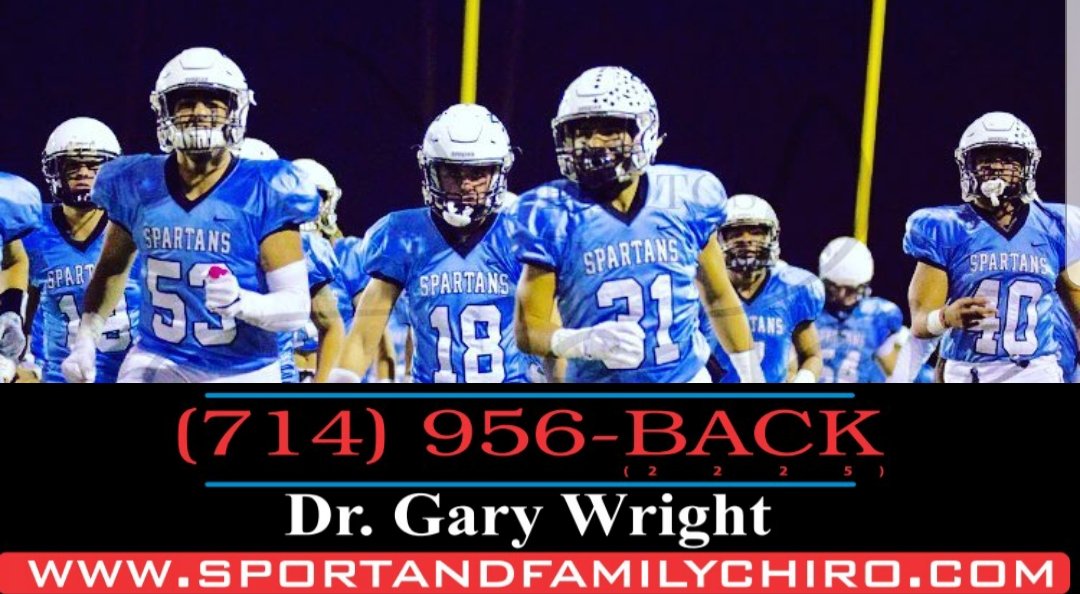 Football team in uniform with Sports & Family Chiropractic branding