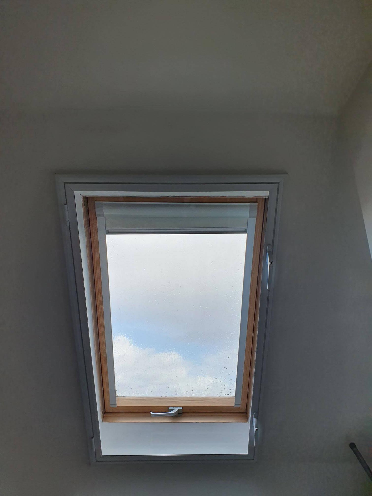 Velux skylight with secondary glazing frame installation in London Camden loft conversion showing sky views