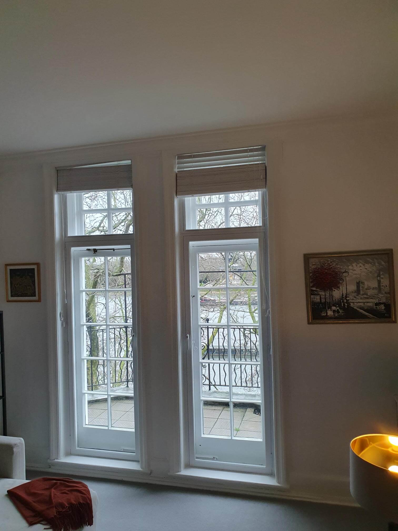 Two French doors with secondary glazing in London Chelsea riverside apartment with Thames views and balcony