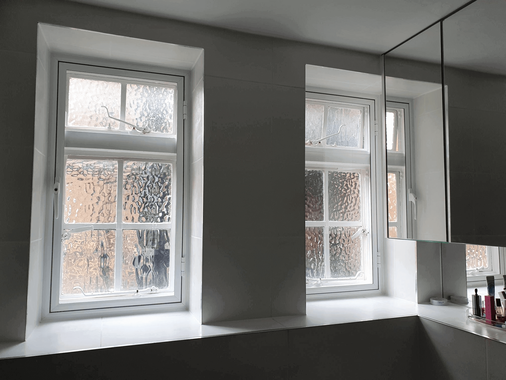 Twin sash windows with obscured glass secondary glazing in London Clapham Victorian bathroom