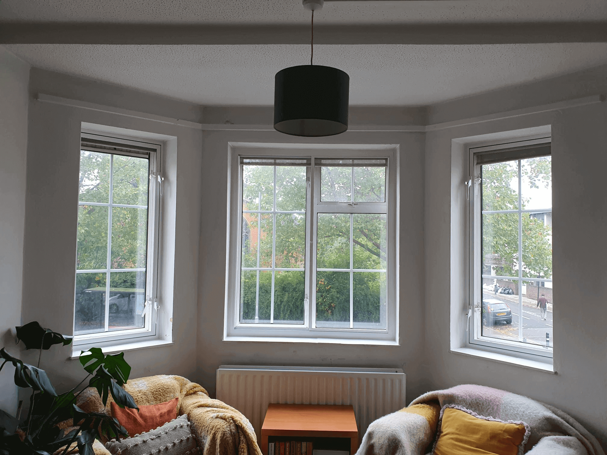 Corner bay window with casement secondary glazing in cosy London Crouch End living room