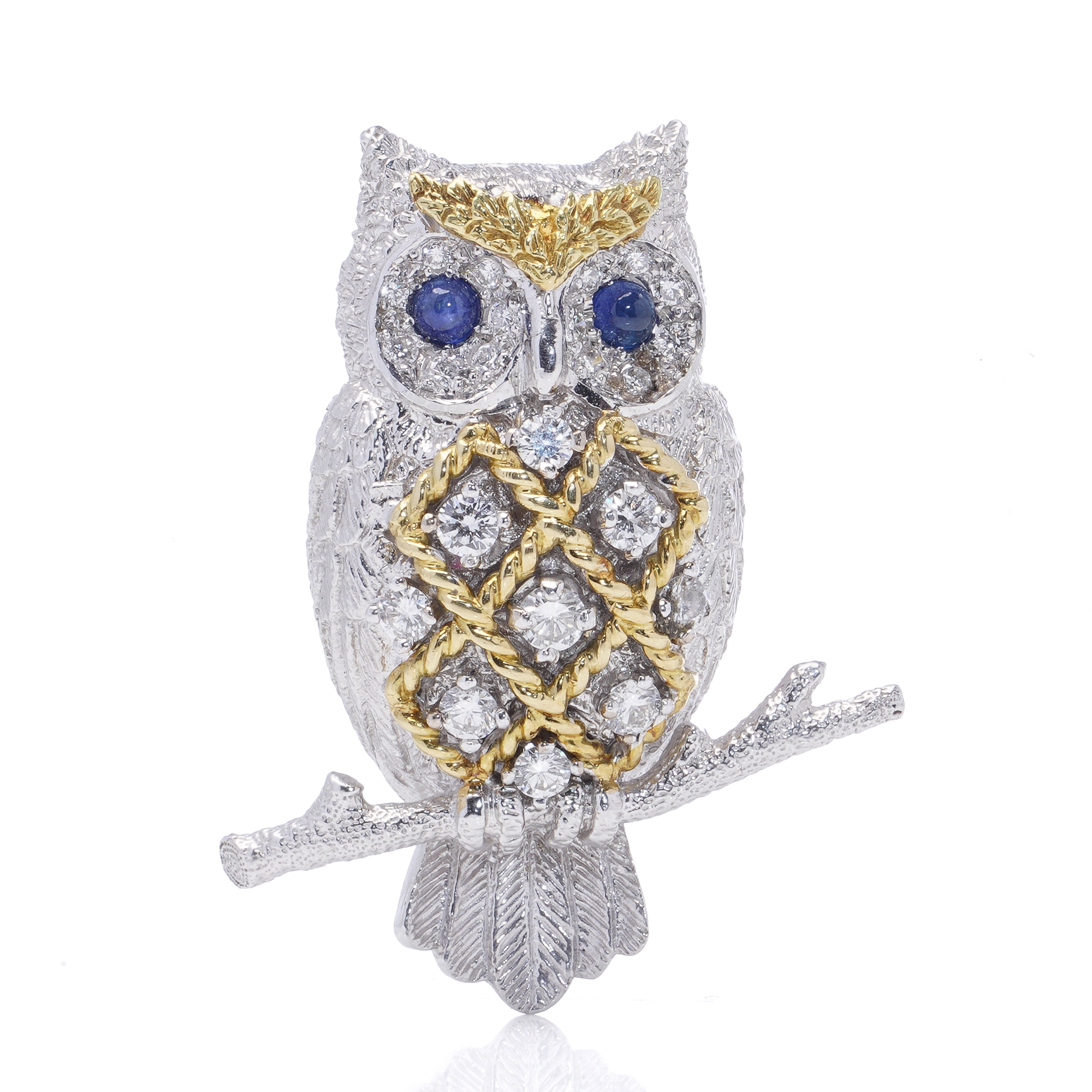 Two-tone owl brooch in white and yellow gold