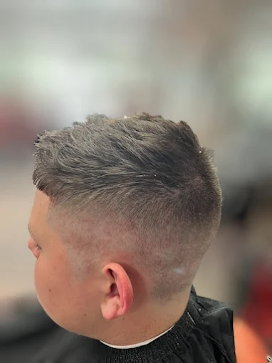 Kid fade haircut with textured top