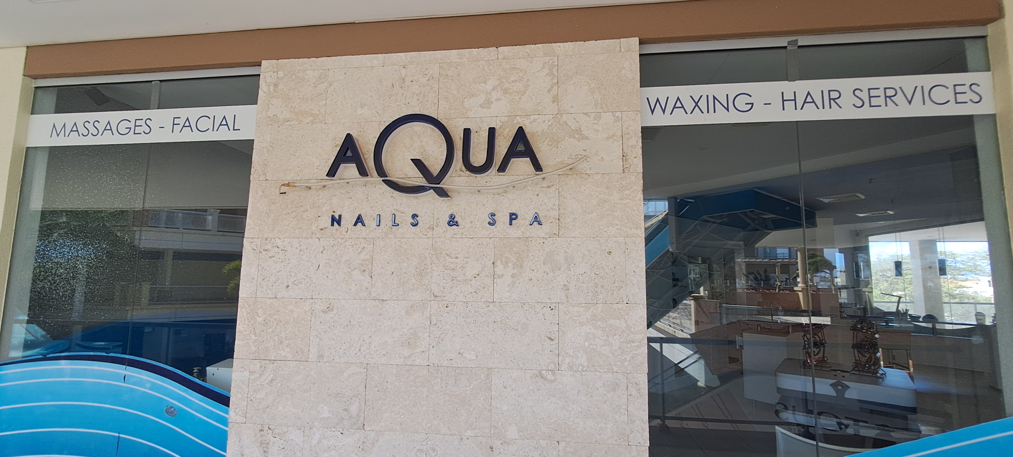 Aqua Nails & Spa storefront at Palm Beach Plaza Mall, Aruba